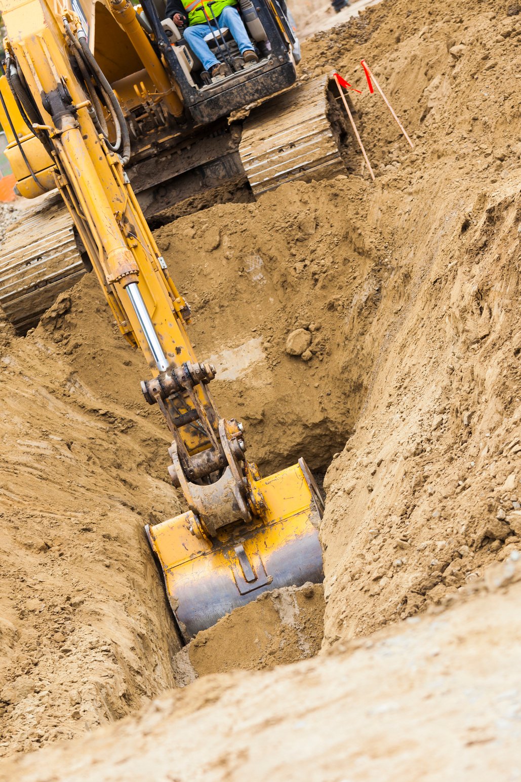 Excavator Tractor Digging a Trench